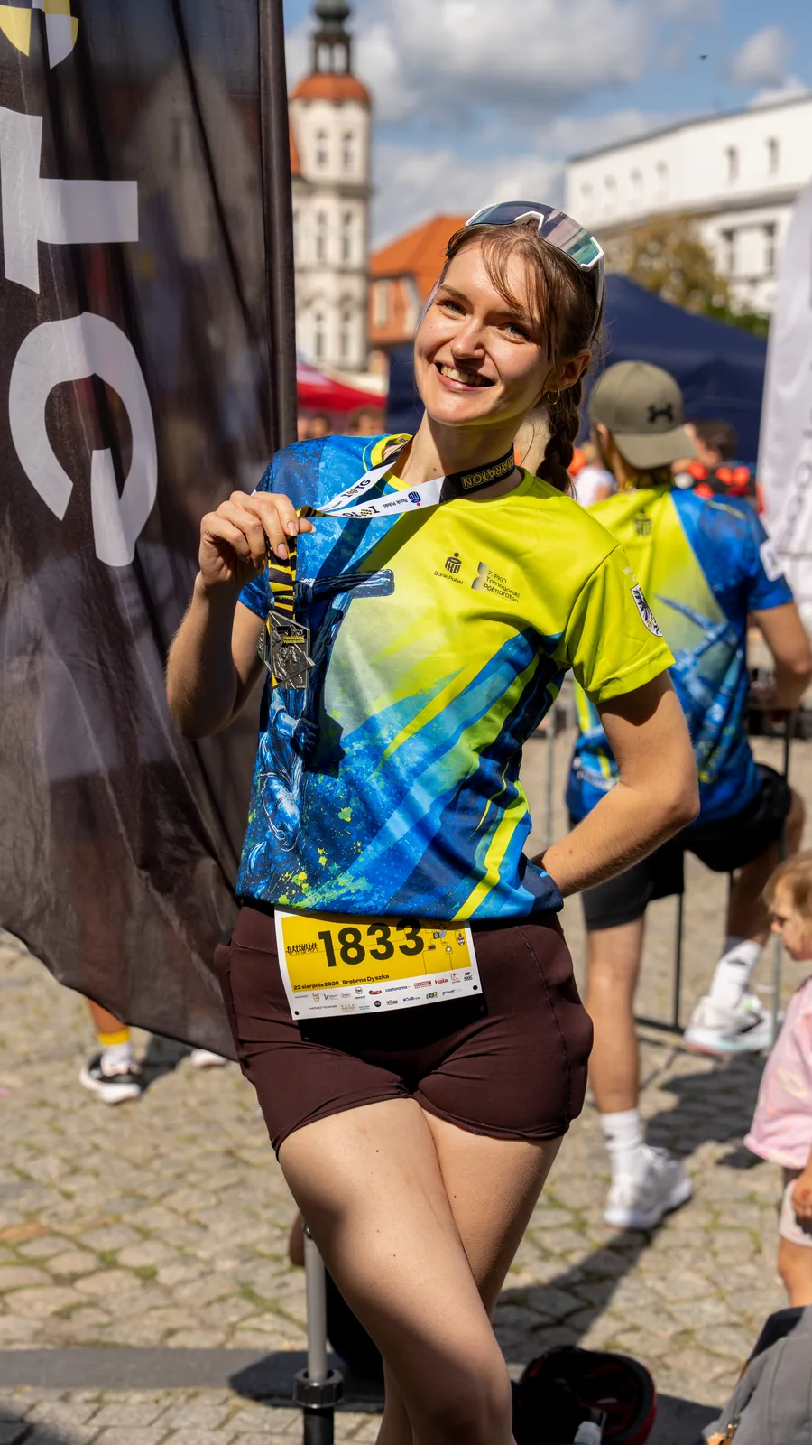 Biegacze na starcie w koszulkach 7. PKO Tarnogórski Półmaraton - fotografia sportowa Śląsk