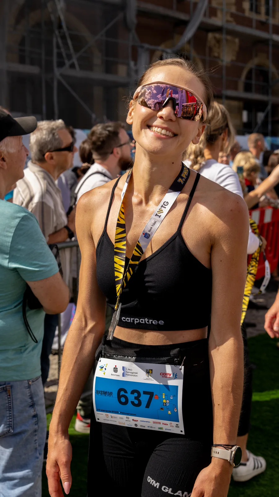 Biegacze na trasie 7. PKO Tarnogórskiego Półmaratonu na rynku - fotograf sportowy Śląsk
